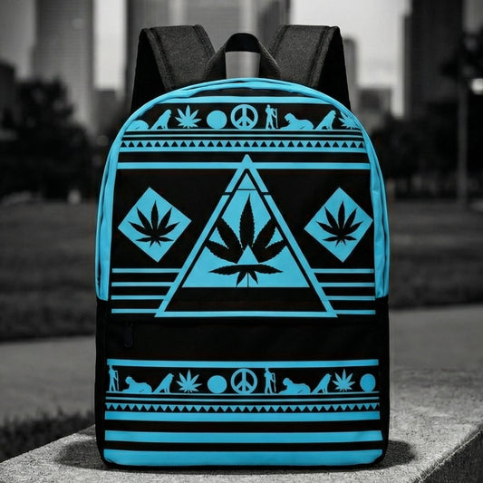 Wide shot of the NGU Gamma Blue backpack resting on a concrete surface in an urban park setting with a monochromatic city skyline background.