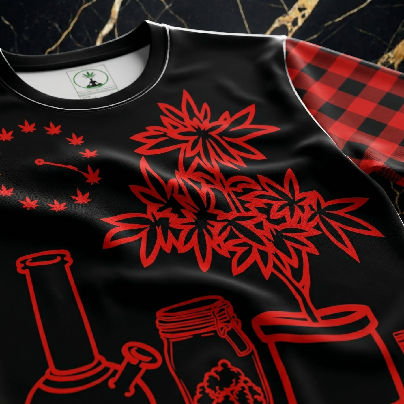 Full-body street view of the Vanguard AOP shirt showing the red and black geometric patterns on both sleeves. Styled with black stacked denim and rugged field boots on Connecticut Ave NW.