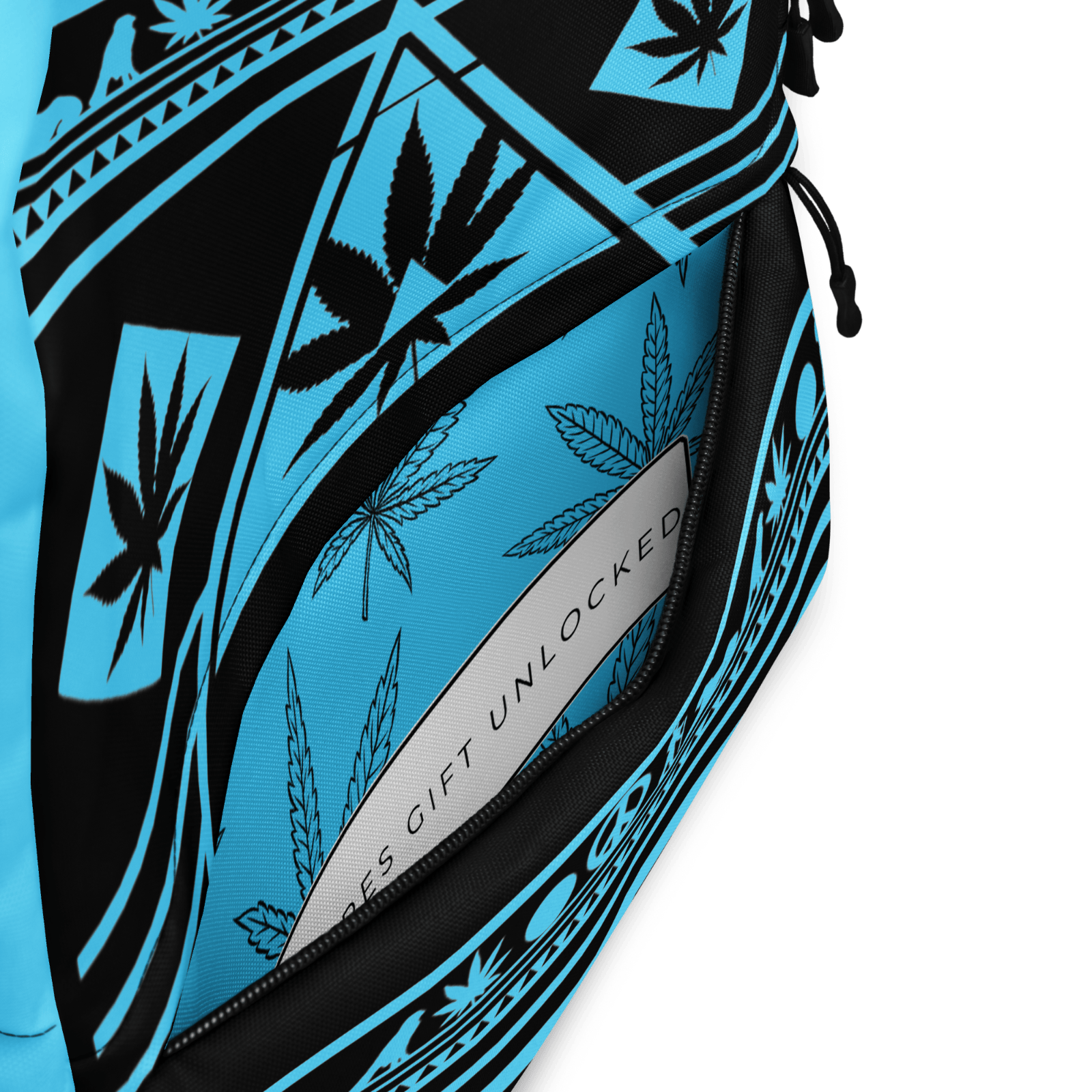 Close-up detail of the cyan-blue AOP print on the front panel of the NGU backpack showing high-fidelity cannabis leaf patterns.