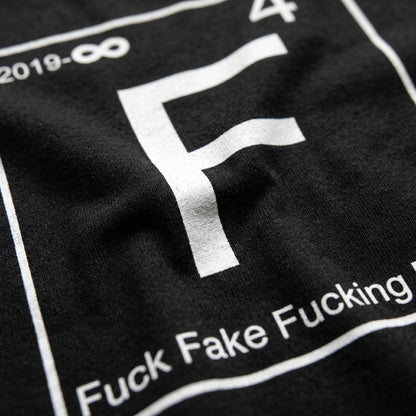 wearing size XL NGU "Fuck Fake Fucking Friends" 400gsm tee in a high-end bedroom mirror reflection lifestyle shot.