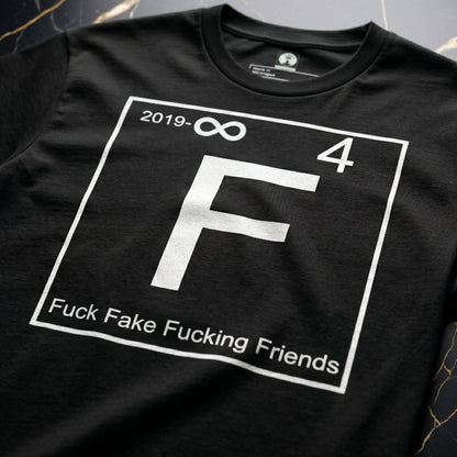Close-up of the white periodic table "F" graphic on NGU "Fuck Fake Fucking Friends" 400gsm matte-weave cotton, showcasing high-density fabric texture