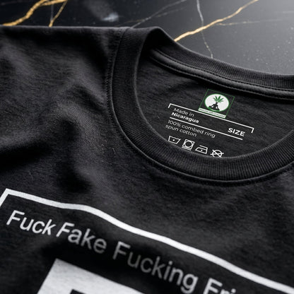 Interior neck branding of the NGU "Fuck Fake Fucking Friends" tee, showing the 400gsm ultra-heavyweight cotton quality and official NGU logo