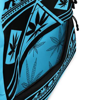 Close-up detail of the cyan-blue AOP print on the front panel of the NGU backpack showing high-fidelity cannabis leaf patterns.
