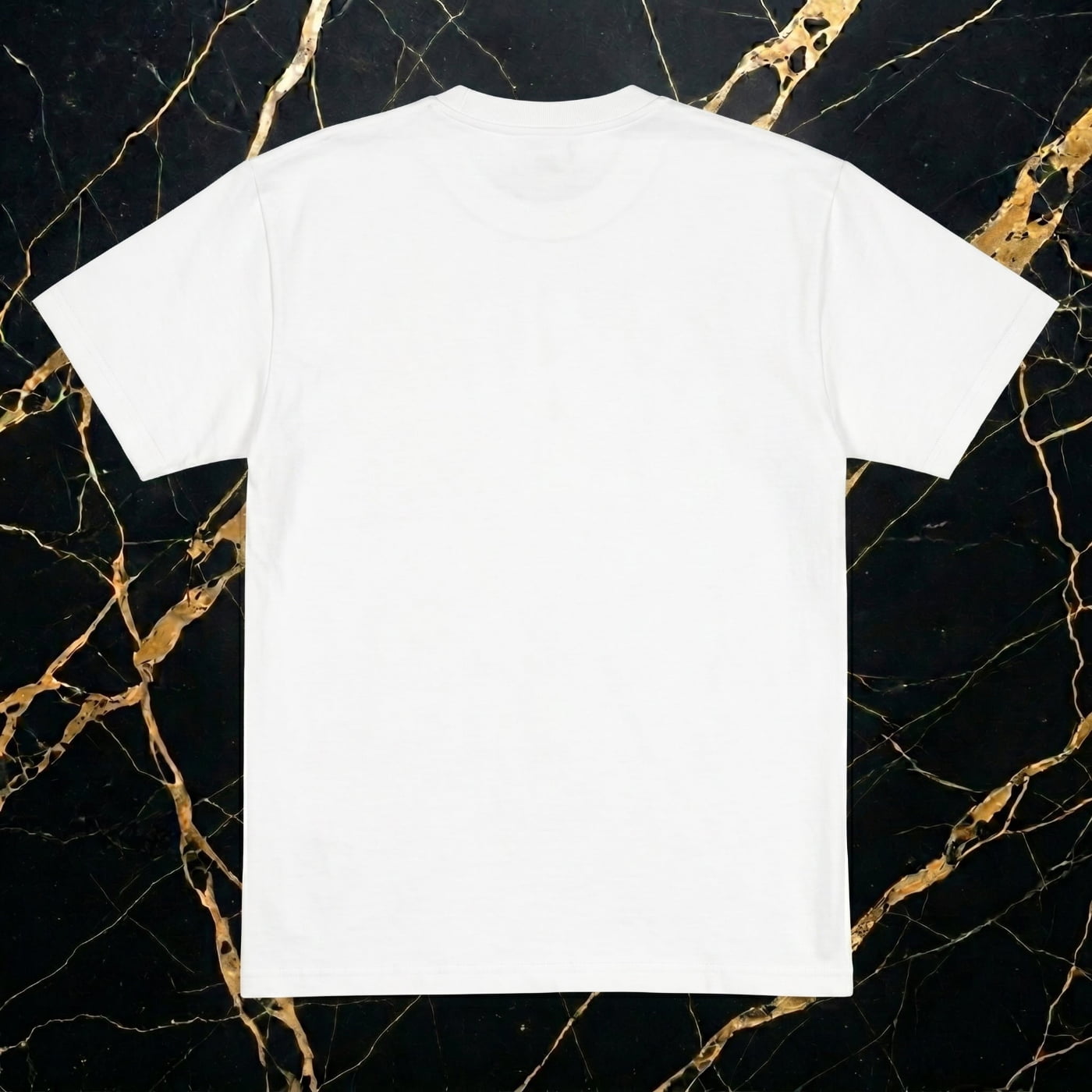 Rear view of the NGU Vanguard shirt showing the solid Snow White back panel and reinforced double-stitched hem.