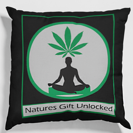 Mindful stoner décor: a black and green throw pillow with a meditating man and a floating white marijuana leaf.